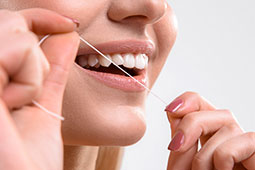 Как пользоваться зубной нитью?